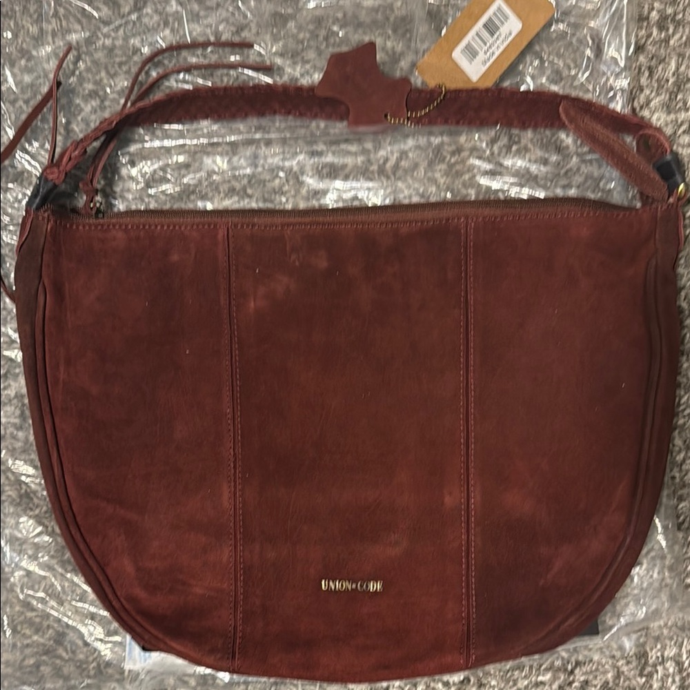 Red Hobo Bag with Soft Texture and Curved Shape